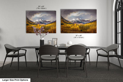 a dining room with a table and chairs