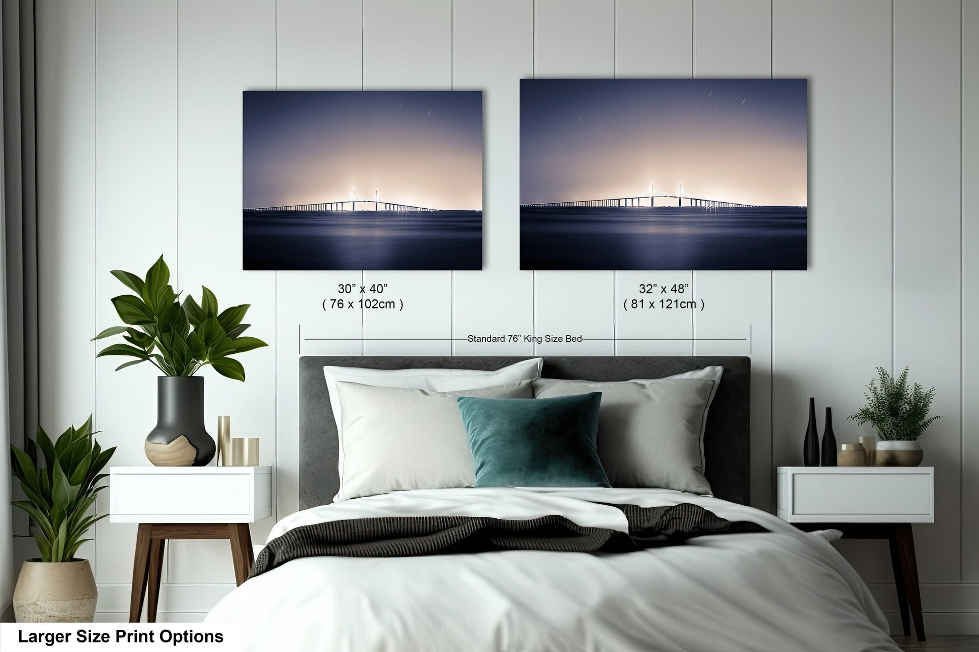 a bed with two pictures of a bridge on the wall above it