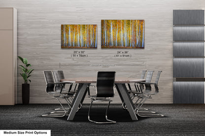 a dining room table with chairs and a painting on the wall
