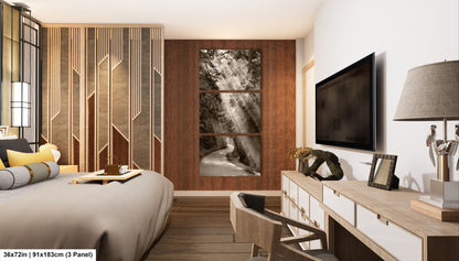 a bedroom with a bed, desk and television