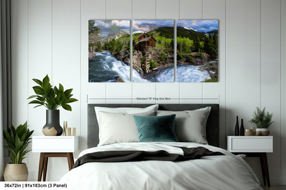 a bed room with a neatly made bed and two paintings on the wall