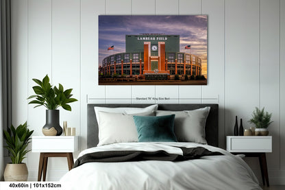 a bed in a room with a picture on the wall