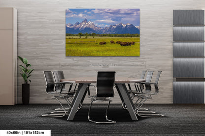 a dining room table with a view of the mountains