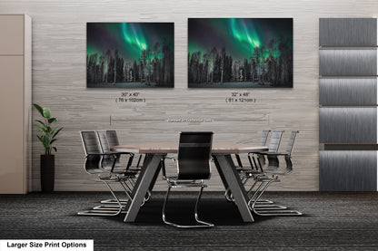 a room with a table and chairs and two pictures on the wall