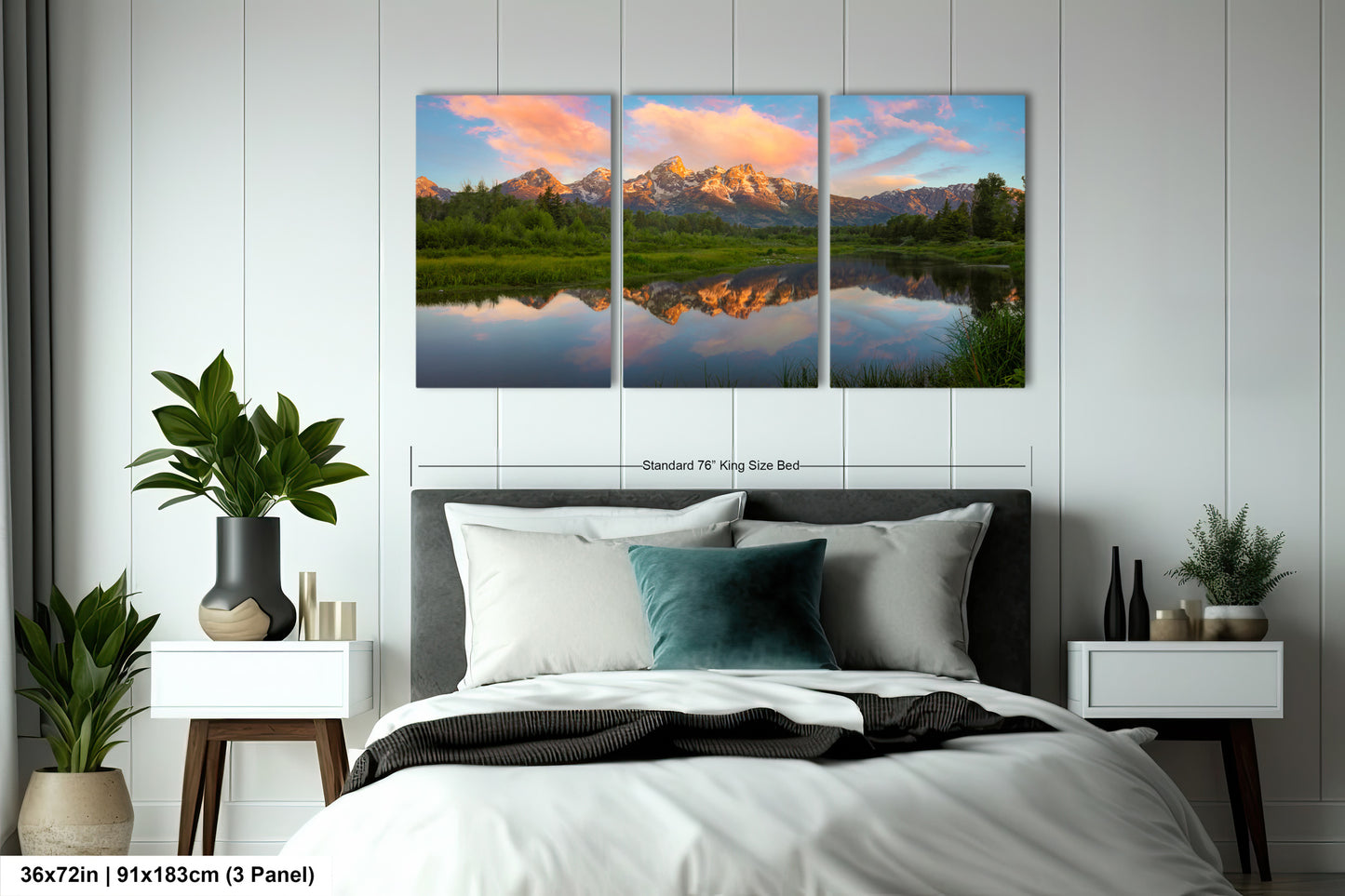 a bedroom with a large bed and three paintings on the wall