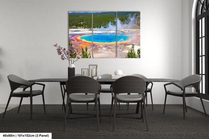 a dining room table with chairs and a painting on the wall