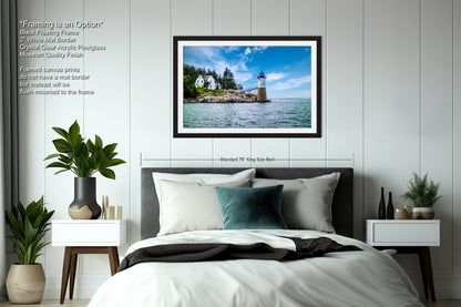 a bedroom with a picture of a lighthouse on the wall