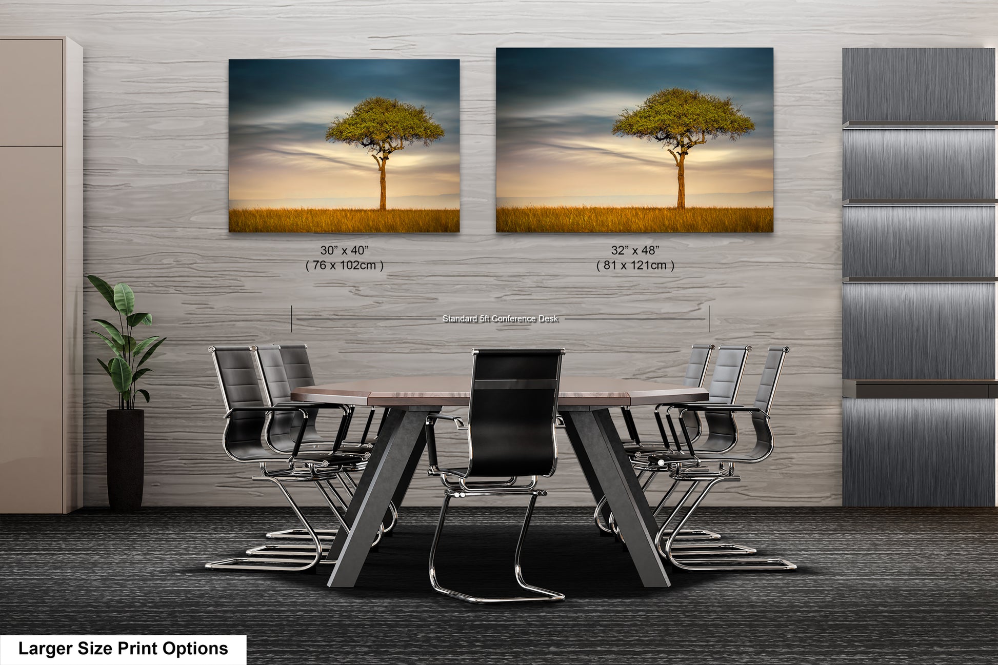 a dining room table with chairs and two pictures of a tree