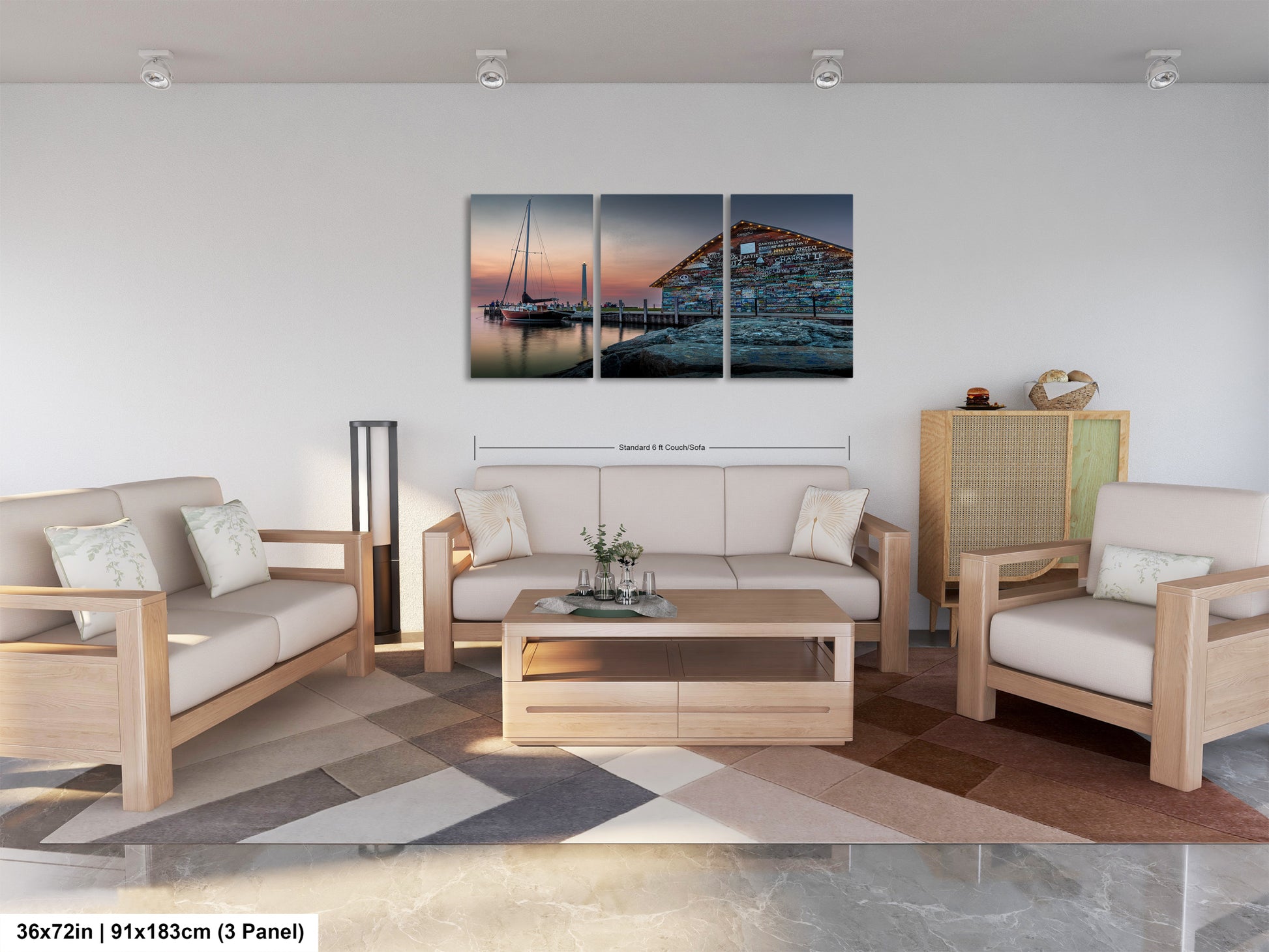 The image is a modern living room with a large wall art piece depicting a serene seascape at sunset. The room is furnished with a white sofa, a wooden coffee table, and a potted plant. The overall design and decor create a calm and inviting atmosphere.