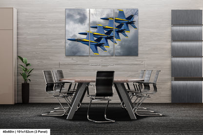 a group of fighter jets flying through the sky