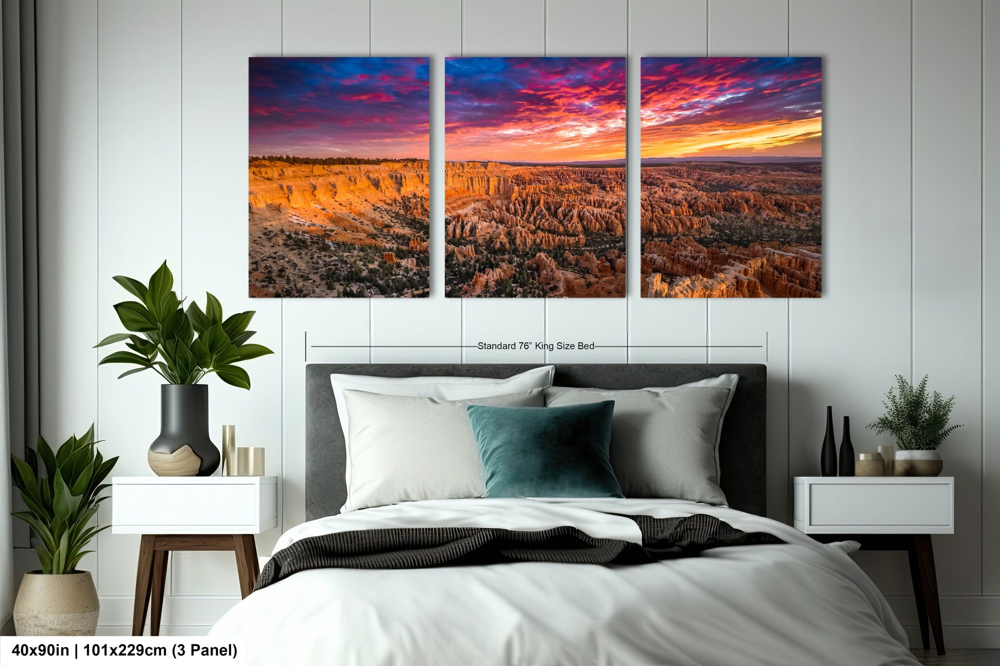 a bed room with a neatly made bed and two pictures on the wall
