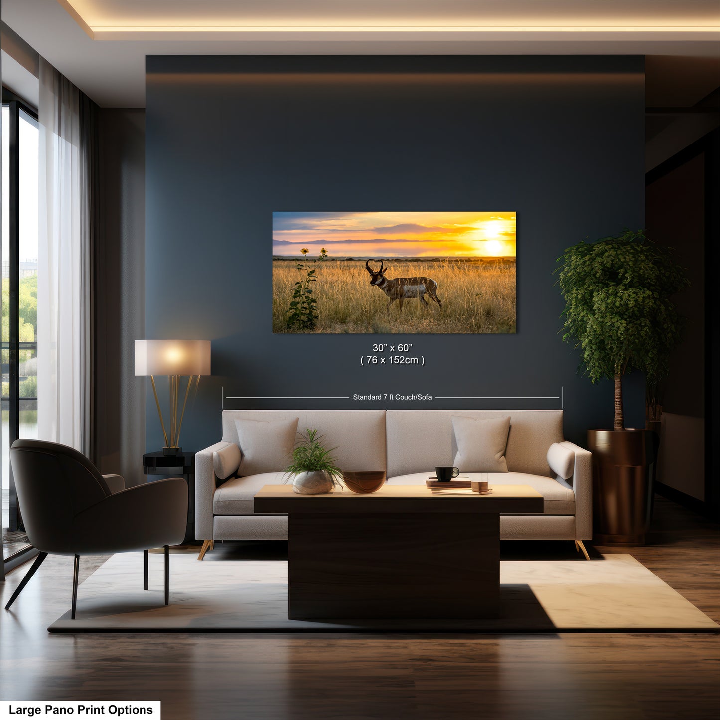 A modern living room with a large painting of a deer in a field on the wall, a sofa, a coffee table, and a lamp.