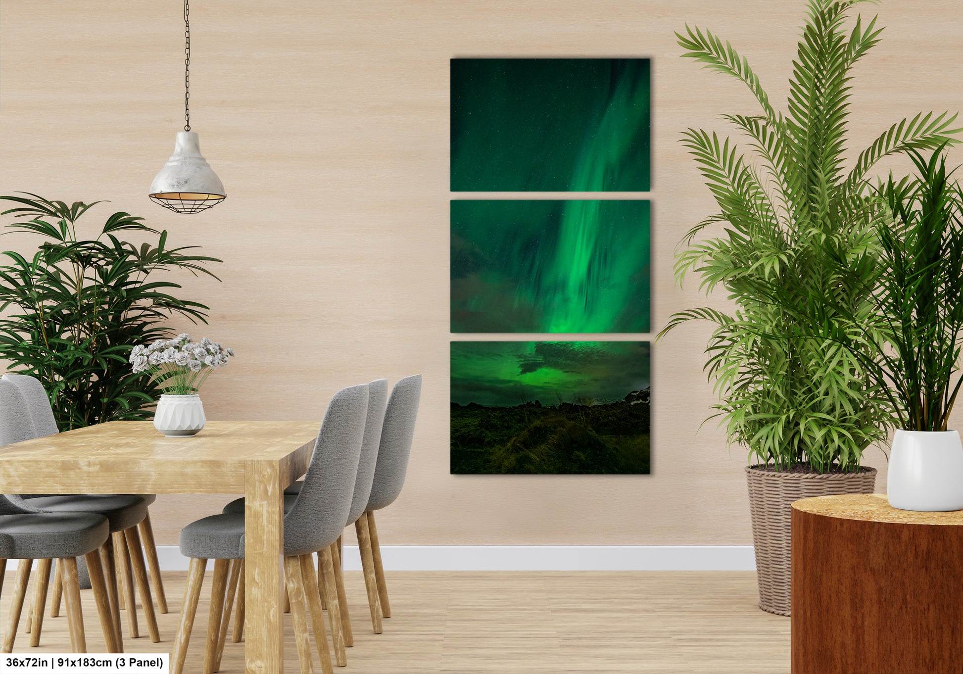 a modern dining room with a wooden table and chairs, a potted plant, and a hanging light fixture. The room has a neutral color scheme and features a large painting of the Aurora Borealis ( Aurora ) on the wall.