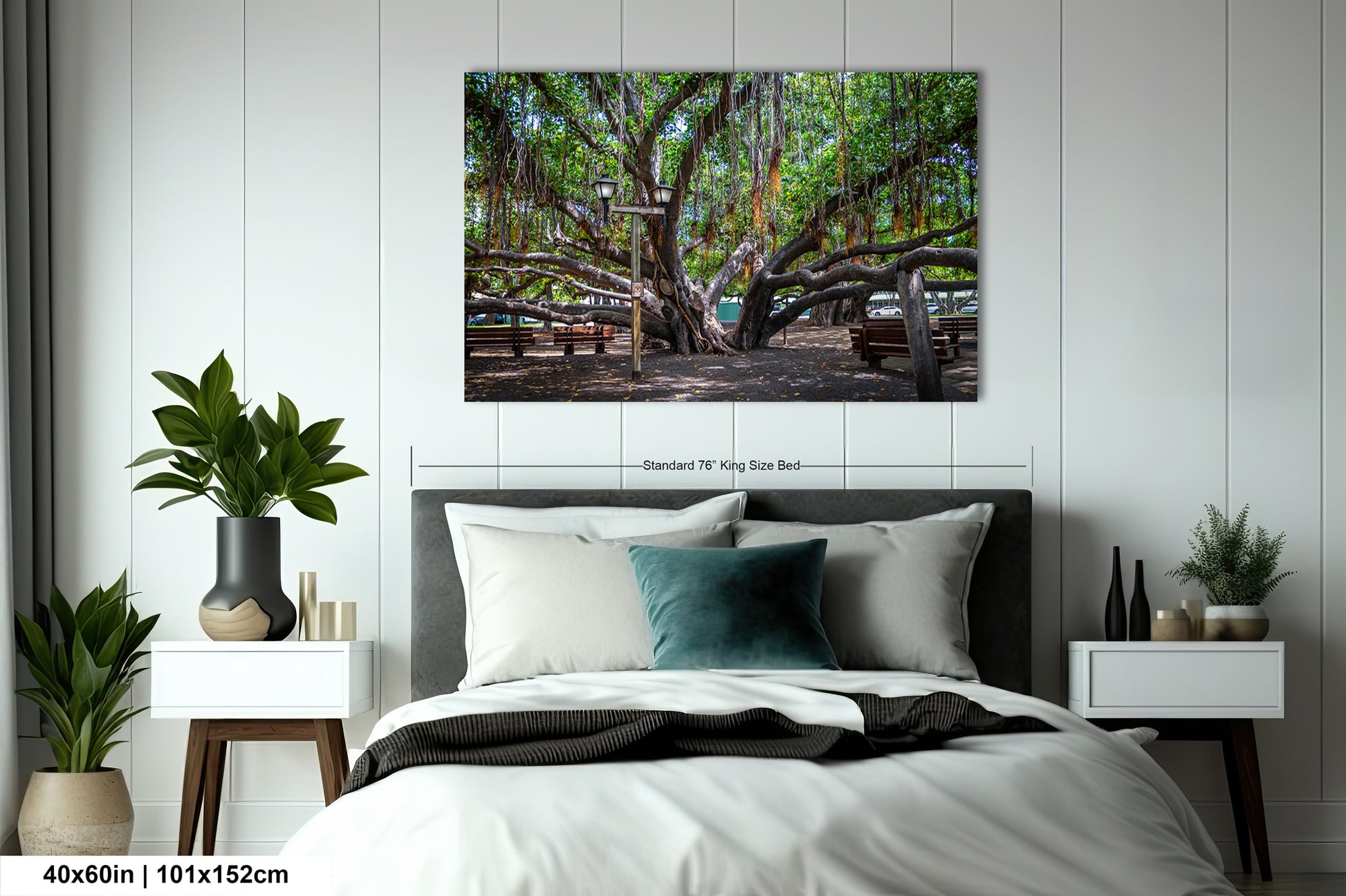 a bedroom with a bed and a painting on the wall