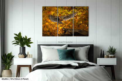 a bedroom scene with focus on the bed and the owl on the branch