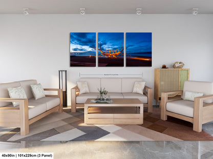 a living room filled with furniture and a painting on the wall