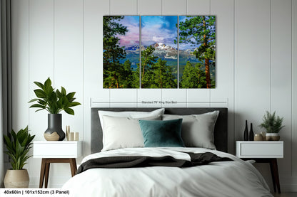 a bedroom with a large bed and a painting on the wall