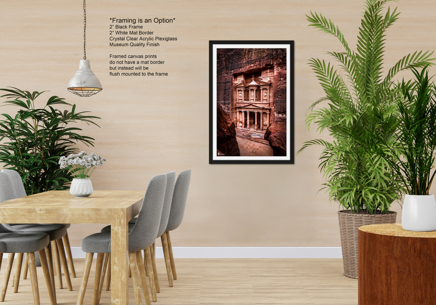a room with a table and chairs and a picture hanging on the wall