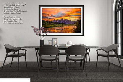 a dining room with a table and chairs