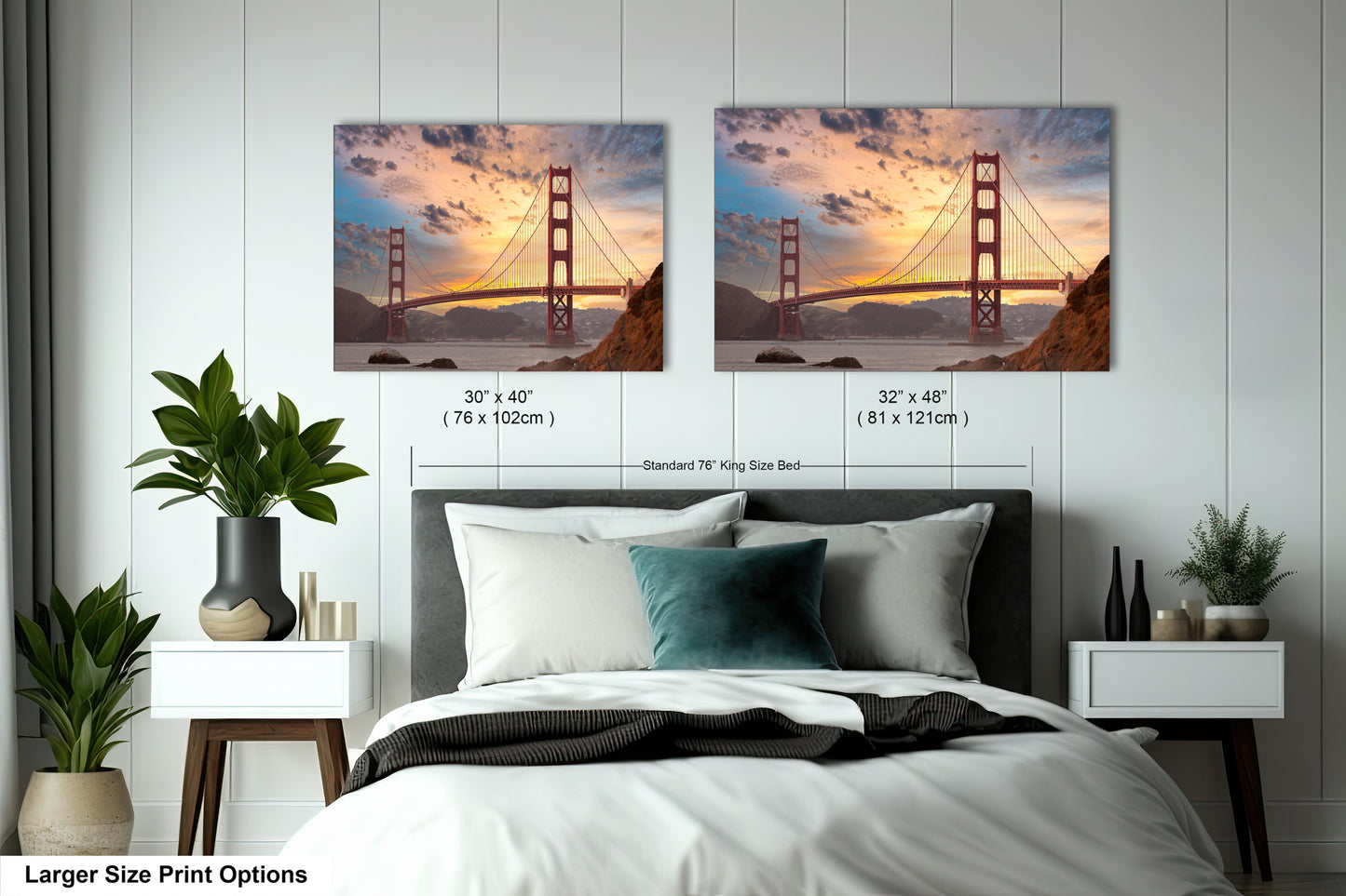 a bed room with a large bed and two pictures on the wall