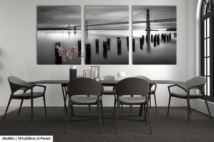 a black and white photo of a dining room table