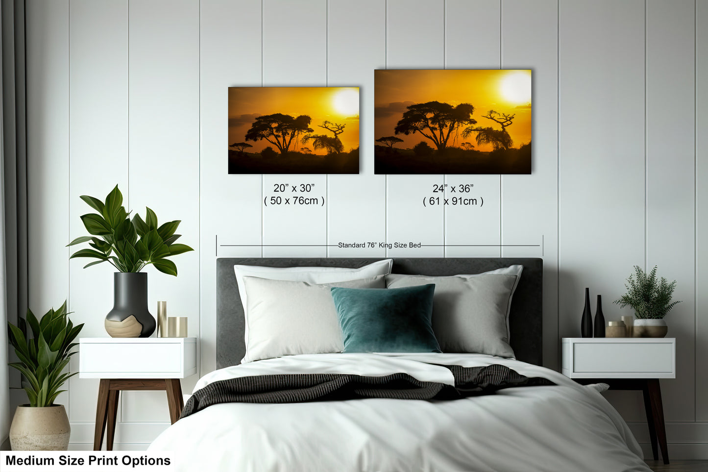 a bedroom with a bed and two pictures on the wall
