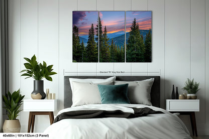 a bedroom with a large, colorful painting of a mountain landscape hanging on the wall above the bed.