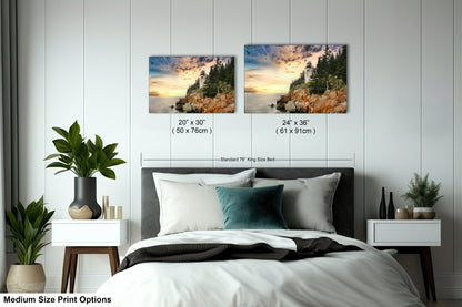 a bed room with a neatly made bed and two pictures on the wall