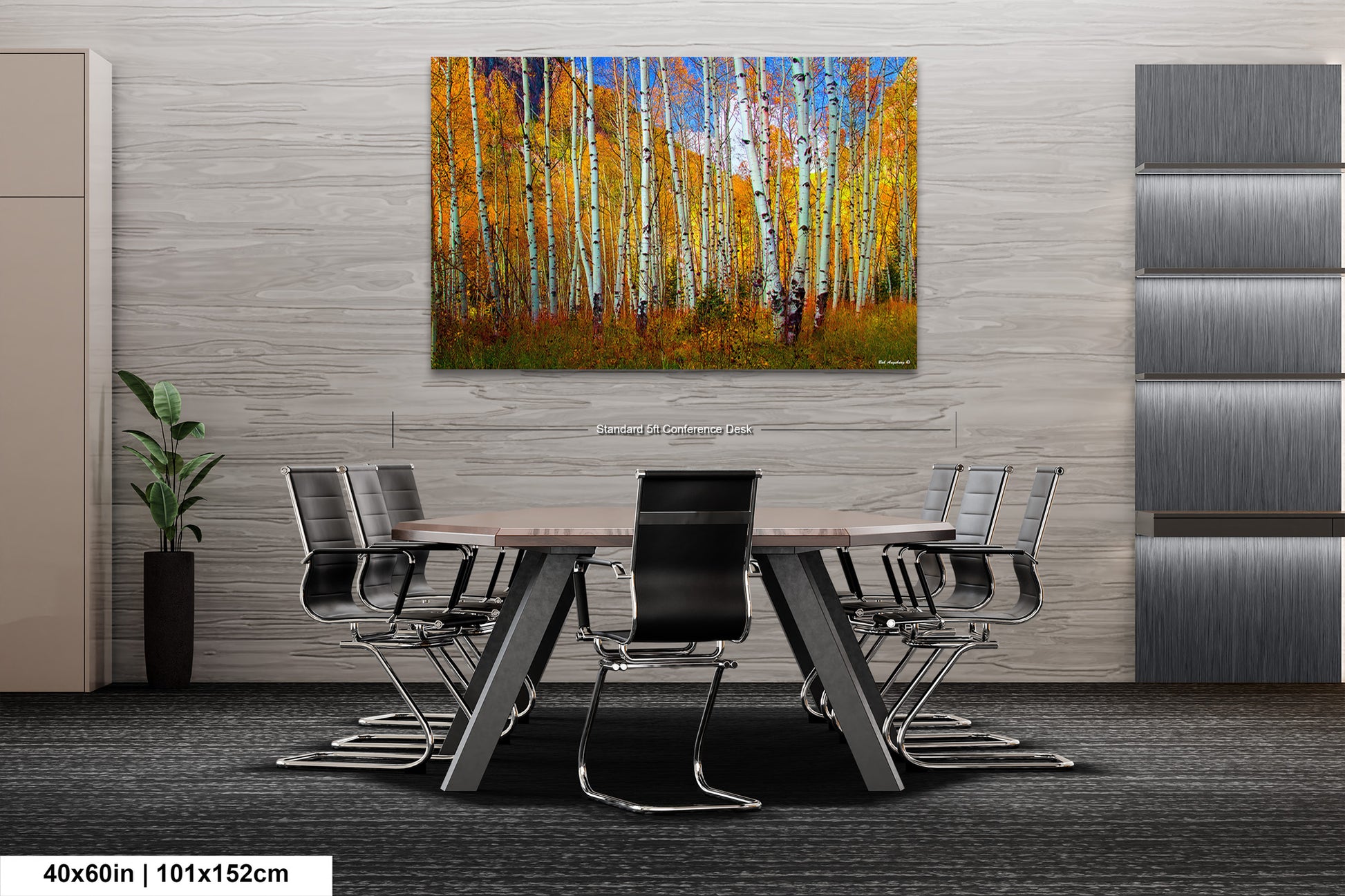 a dining room table with chairs and a painting on the wall