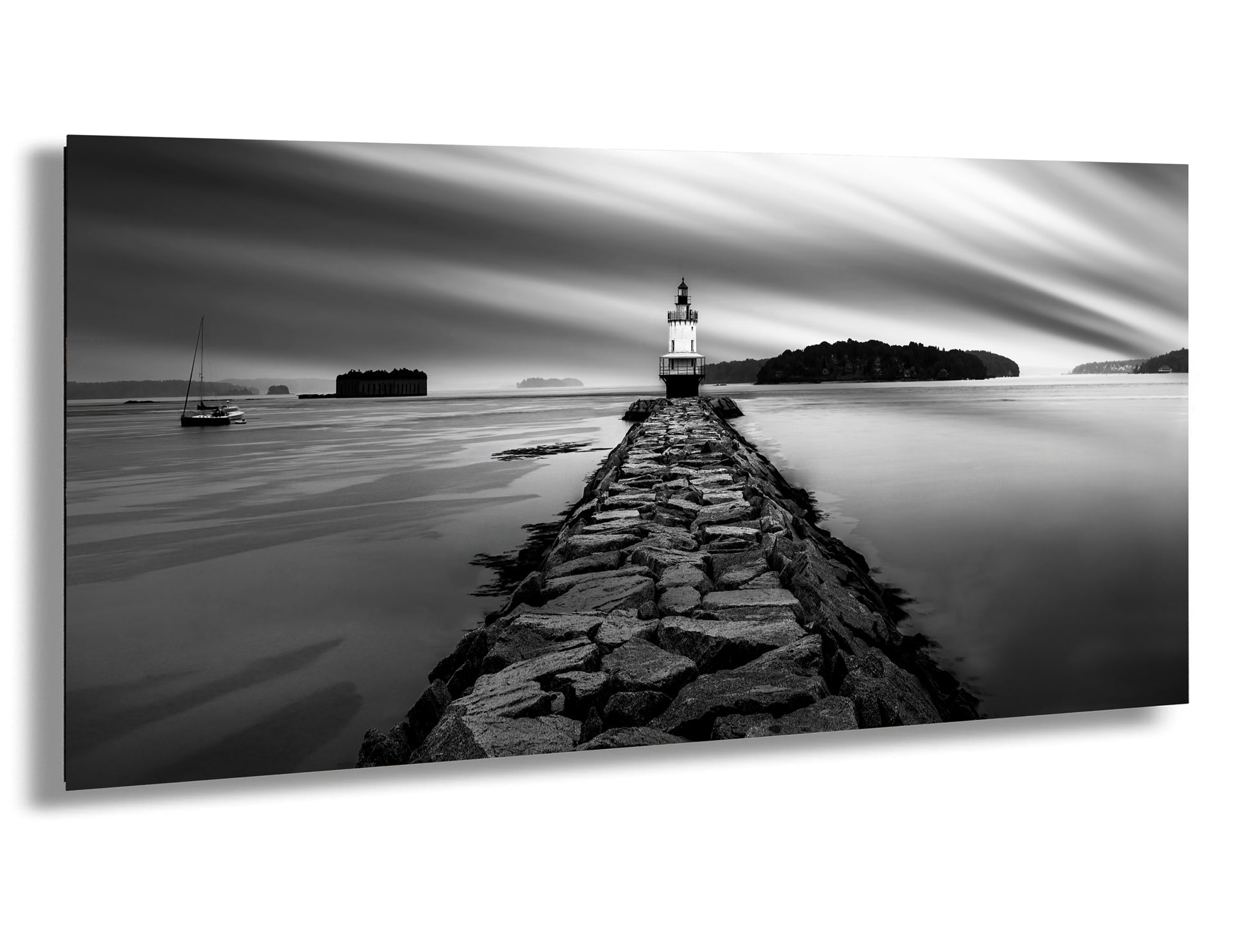 a black and white photo of a lighthouse