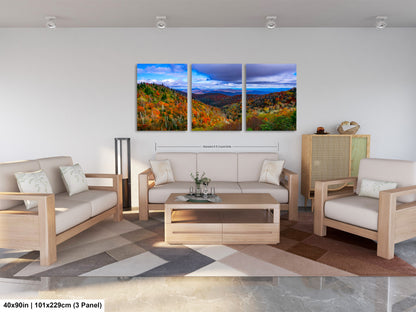 a living room filled with furniture and a painting on the wall