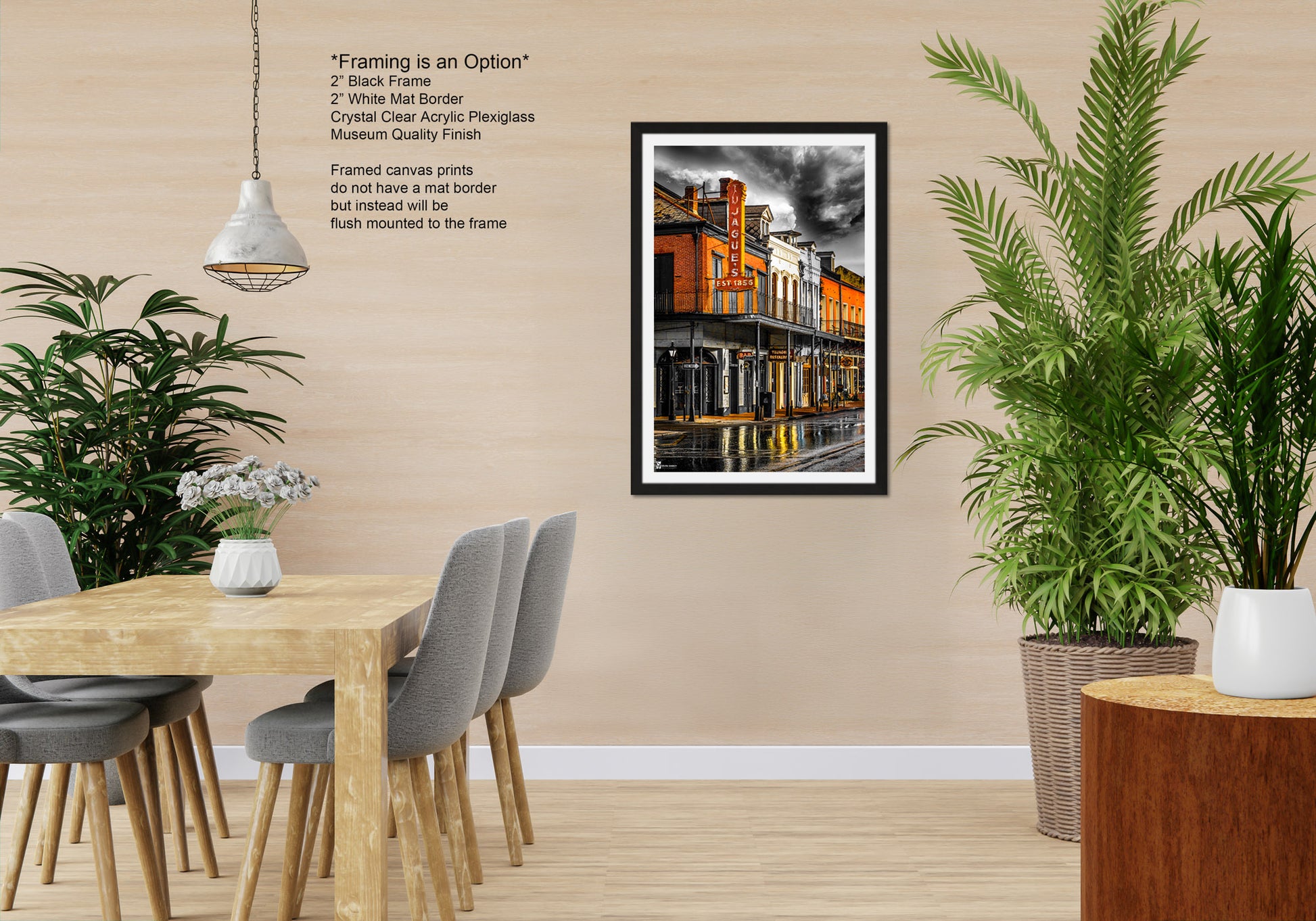 a room with a table and chairs and a potted plant