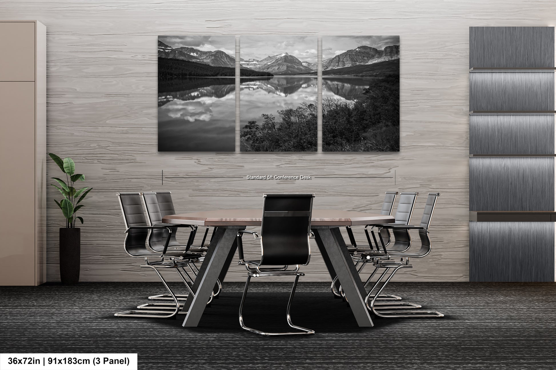 a black and white photo of a table and chairs