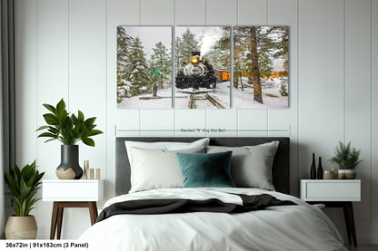 a bedroom scene with focus on the bed and a train on the tracks