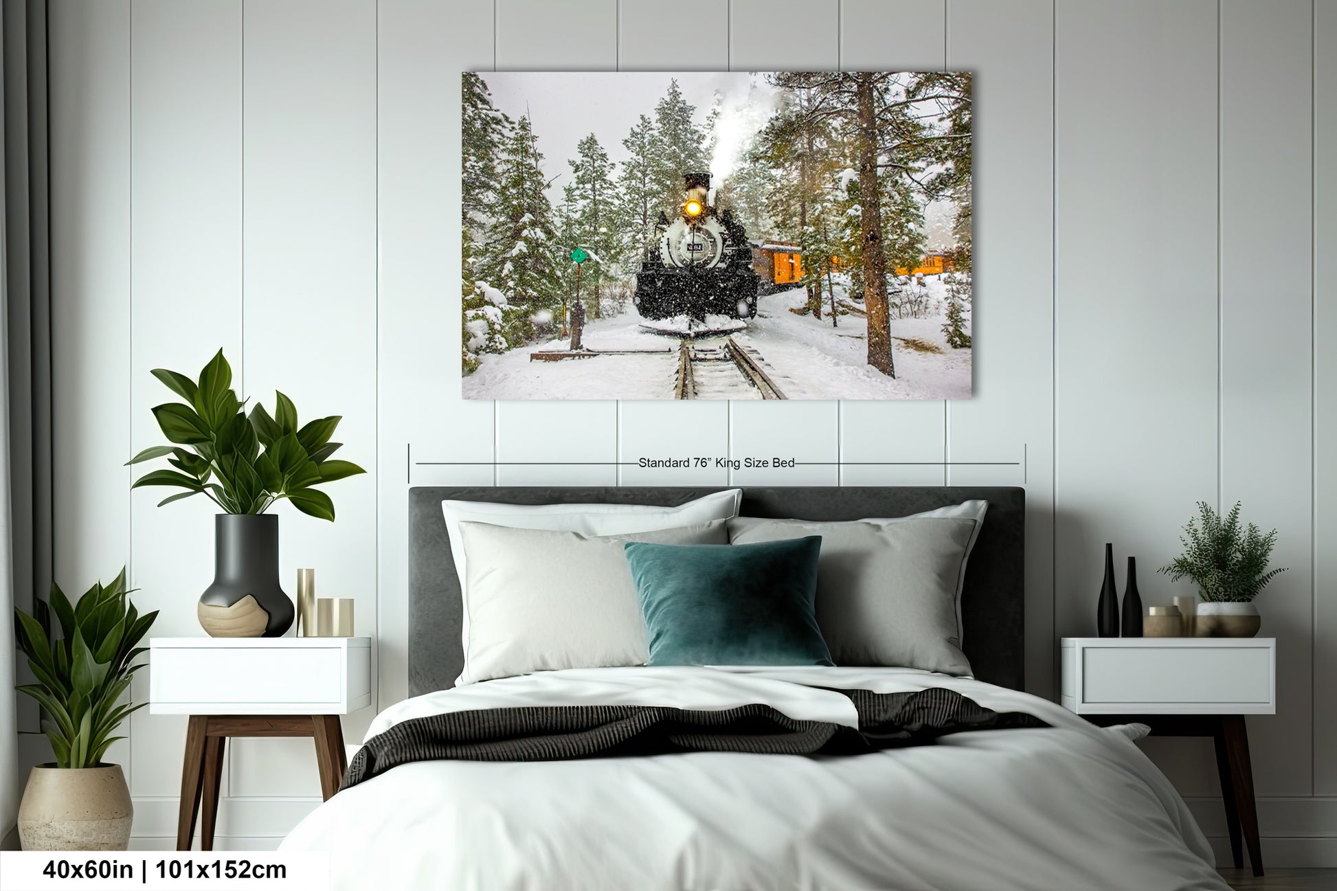 a bed room with a neatly made bed and a painting on the wall