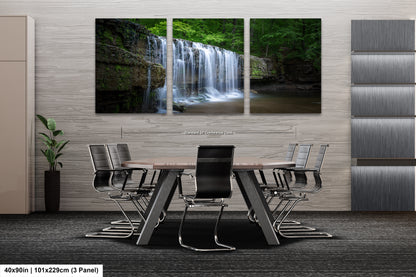 a dining room table with a waterfall in the background