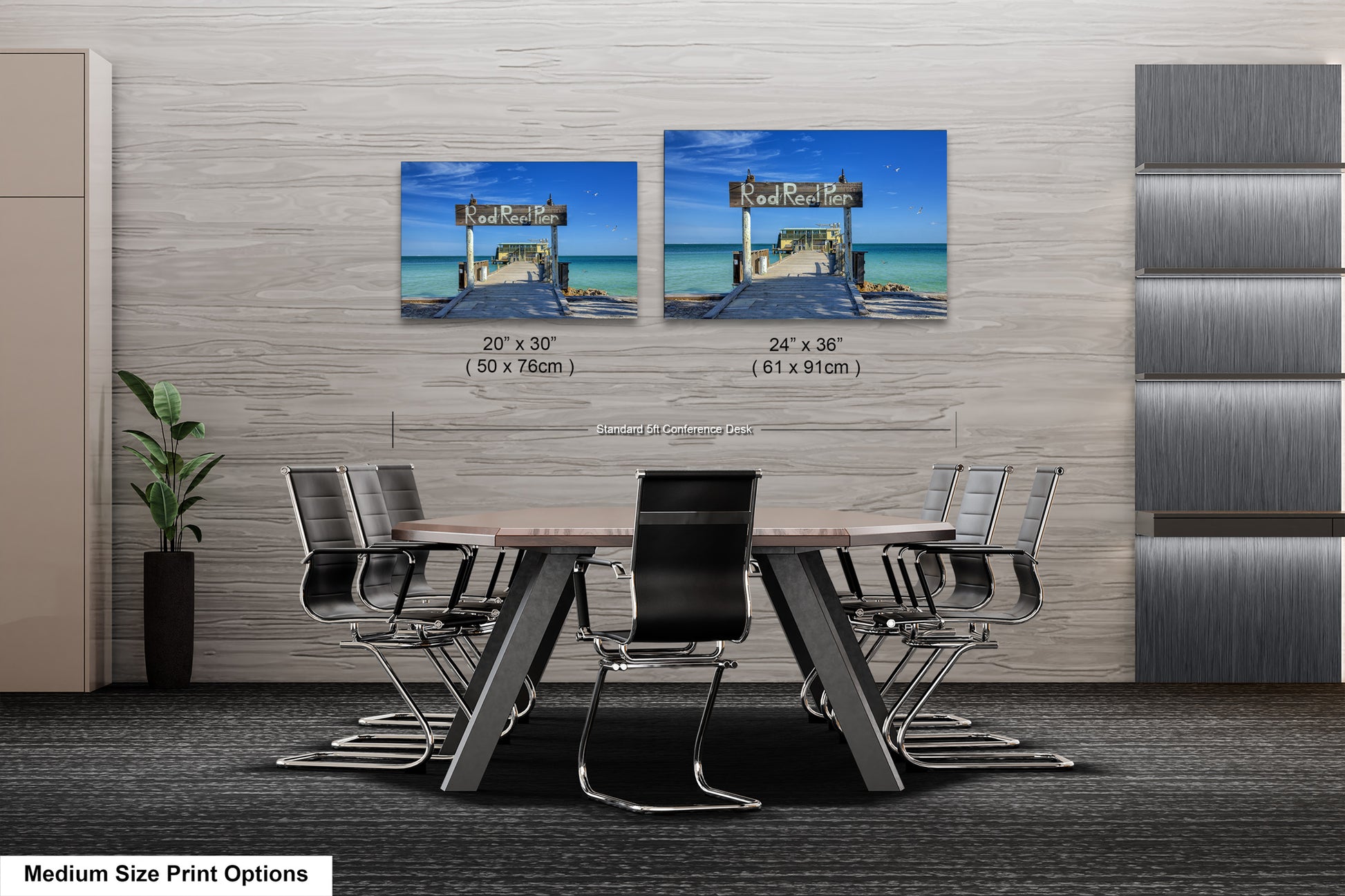 a dining room table with chairs and two pictures on the wall