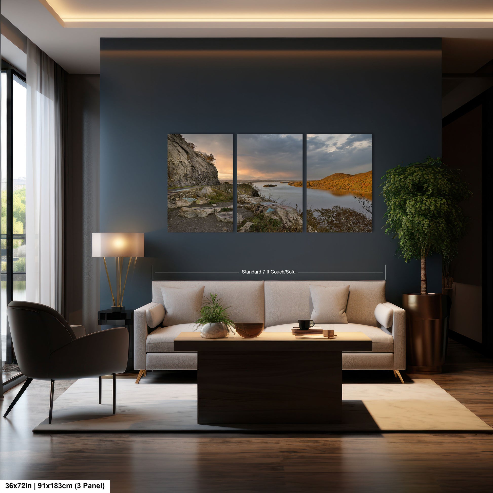 a living room with a couch a table and a painting on the wall