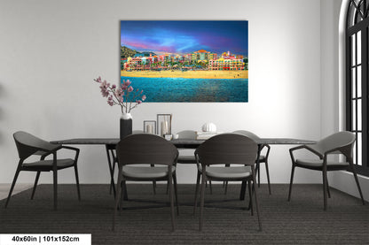 a dining room table with chairs and a painting on the wall