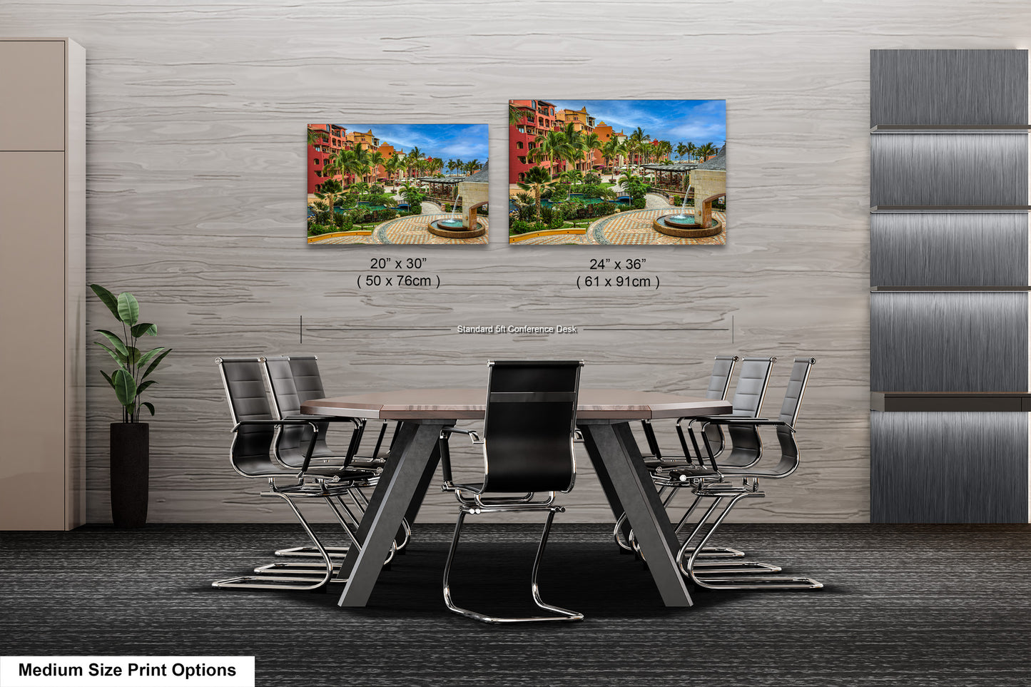 a dining room table with four chairs and a picture of a fountain