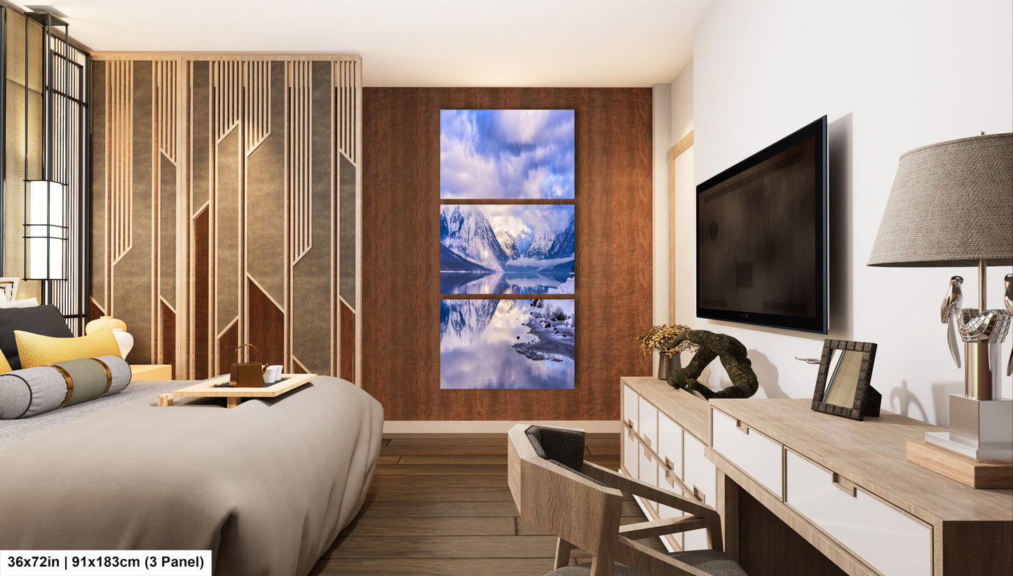 a bedroom with a large bed and a flat screen tv
