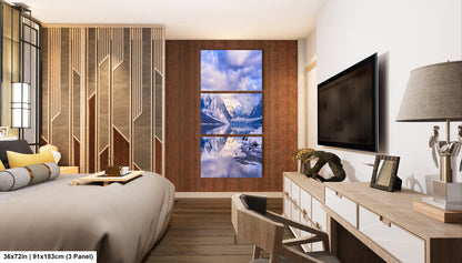 a bedroom with a large bed and a flat screen tv