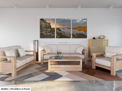 a living room filled with furniture and a painting on the wall