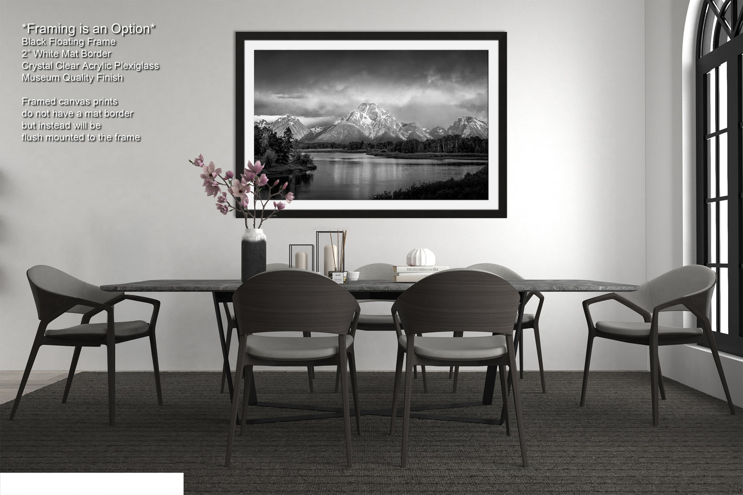 a black and white photo of a table and chairs