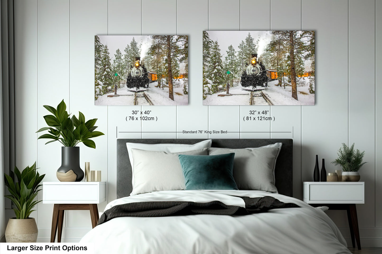 a bed room with two pictures hanging on the wall