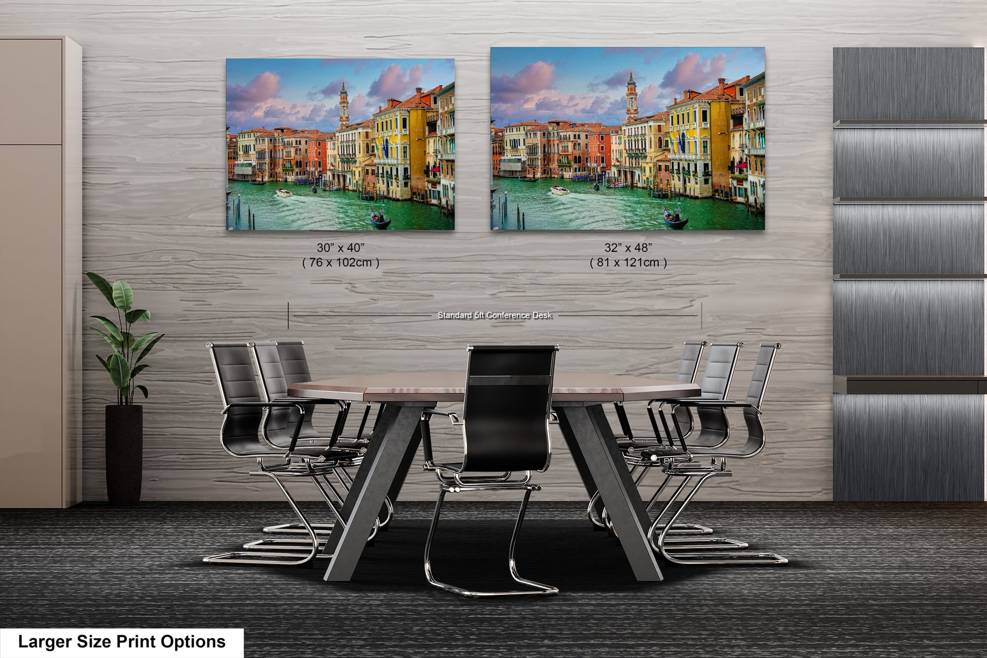 a dining room table with chairs and two pictures on the wall