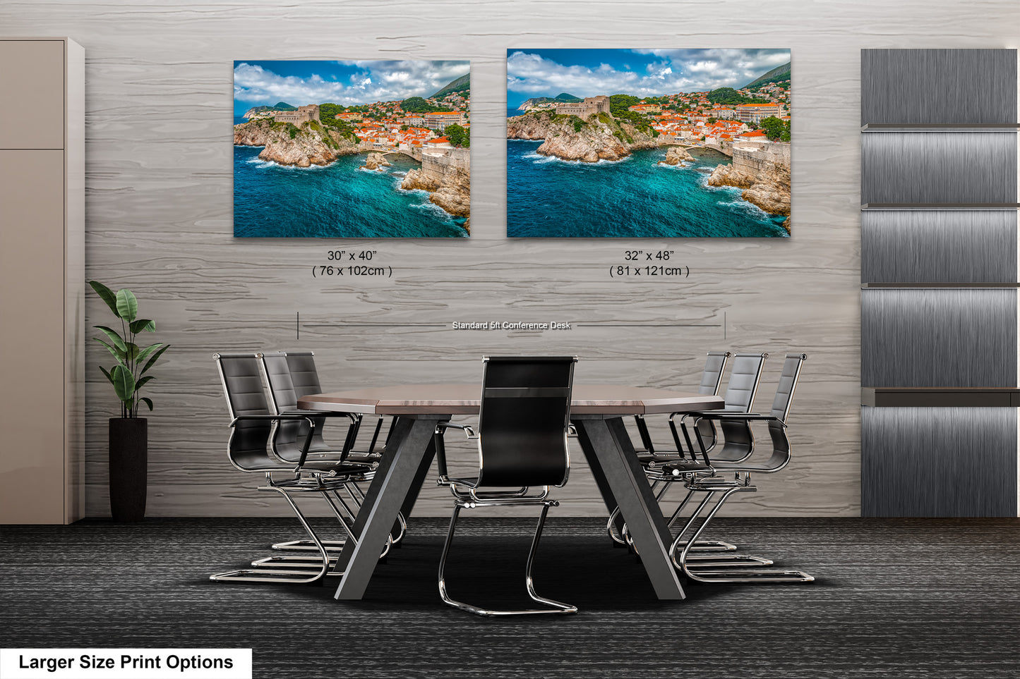 a dining room table with chairs in front of a wall with two pictures of a