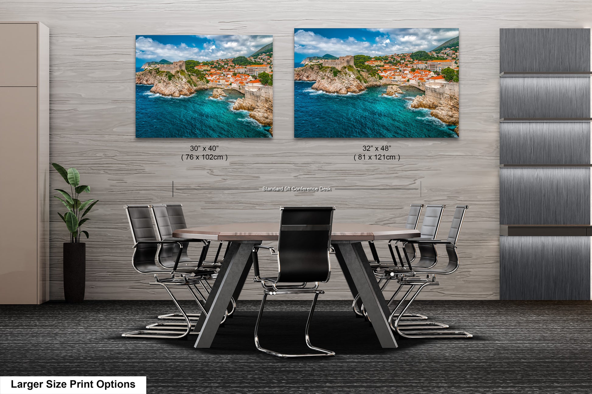a dining room table with chairs in front of a wall with two pictures of a