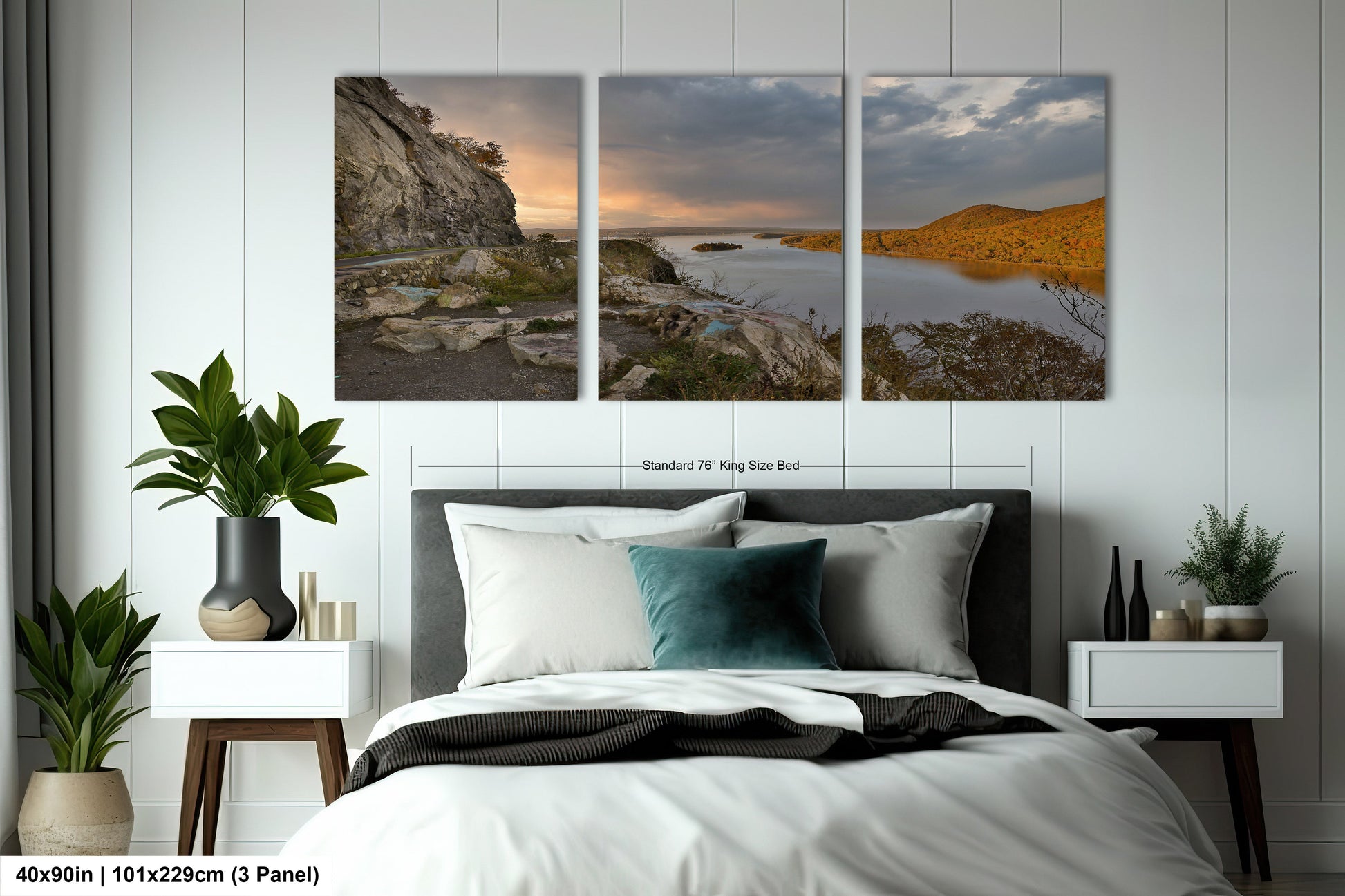 a bedroom with a bed and two pictures on the wall