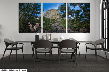 a dining room with a table and chairs